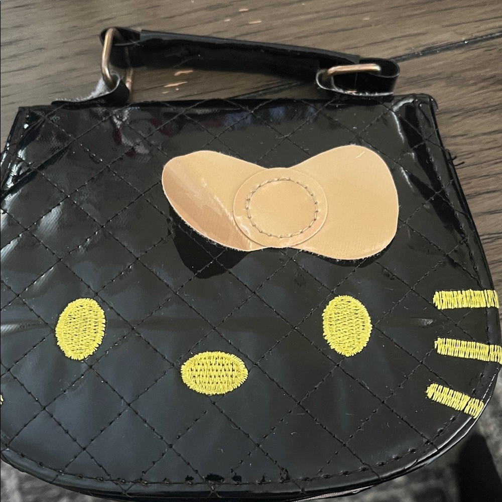 Hello Kitty Black Mini Bag with Yellow Details